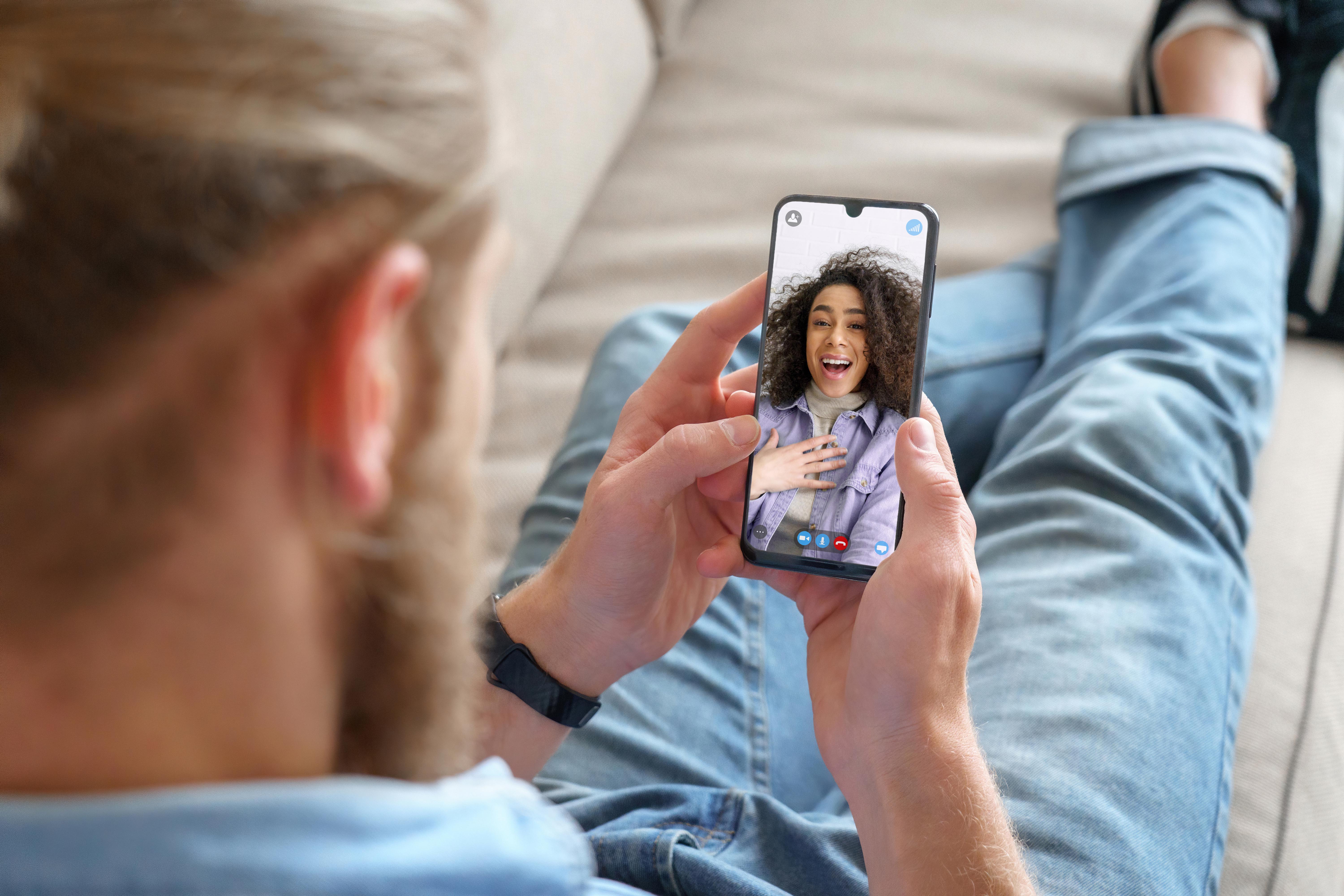 Young couple on a video dating call at a virtual speed dating event.