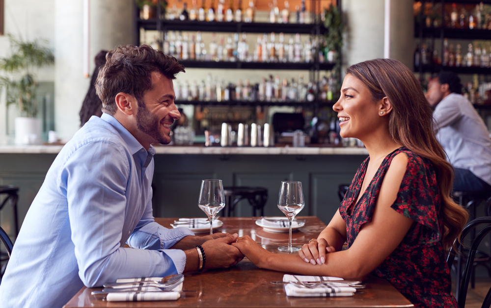 Couple having fun at their first date in a city in UK